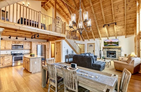 Open consent dining room with A/framed wooden ceiling