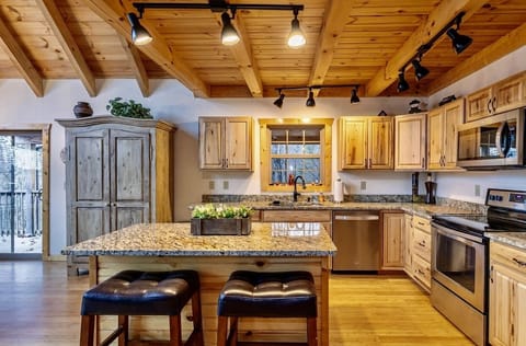 Kitchen is connected to dining room