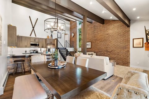 Bright and modern open layout featuring the dining room, living room, and kitchen—perfect for relaxing or entertaining!