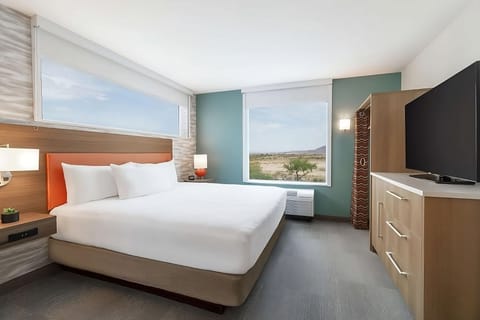 Stretch out on crisp linens with entertainment right at hand.