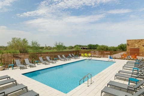 Dive into a sparkling pool and lounge under open skies.