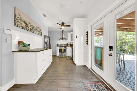 Flora Cottage's kitchen provides enough space for two to three people to prep meals together.