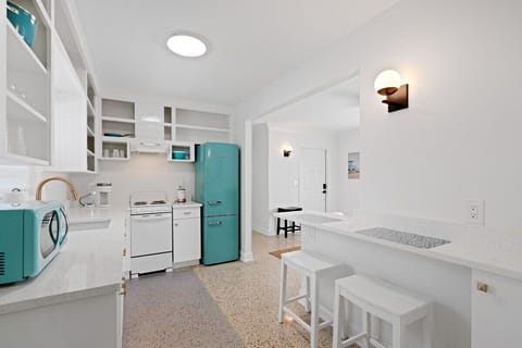 The kitchen has all the amenities needed for a small group.