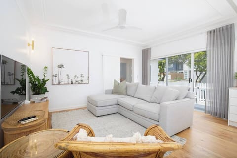 In the evenings, relax in the lounge room with spacious sofa seating and a central TV.