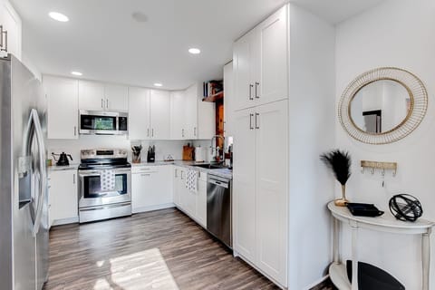Modern countertops and plenty of counter space to go around.