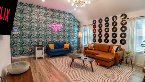 Relax on plush seating, vibe to the record wall, soak in the good vibes in Katy.