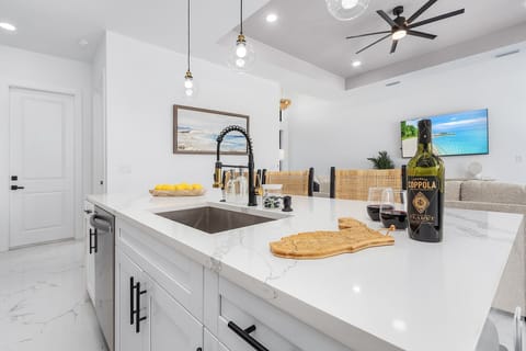 Relax with wine or a cold beverage in our modern kitchen.