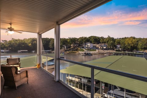 Enjoy a picturesque view of the lake and a beautiful sky during sunset.