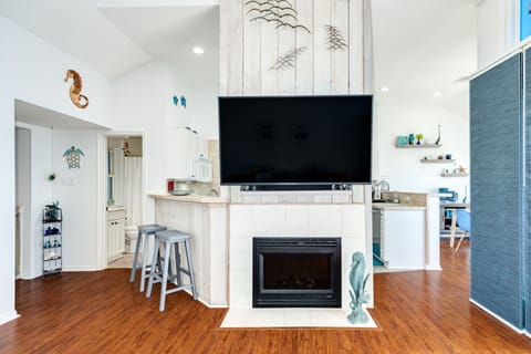 Living area opens to the adjacent kitchen