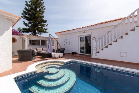 View of villa and private heated pool