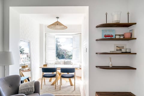 Window seating for four in the dining room allows for easy get-togethers at home.