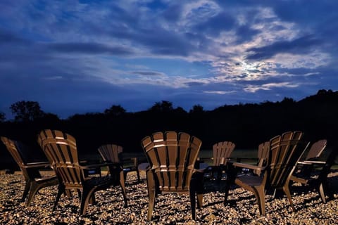 Gather around the fire pit under the stars and enjoy cozy evenings with family and friends. This peaceful spot is perfect for storytelling, roasting marshmallows, and soaking in the stunning night sky.
