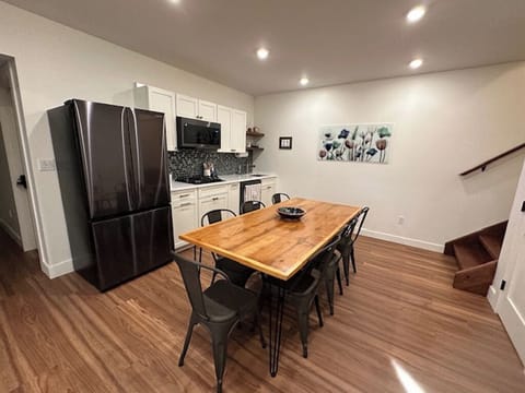 Lower level kitchenette with dining table