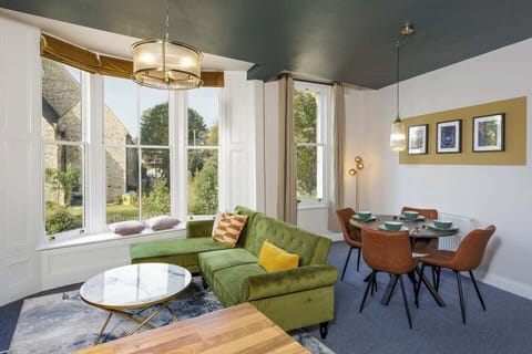 Living Room: Bright and airy space with lush seating and scenic views for delightful gatherings!