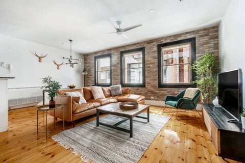 The living area is light and bright and offers a blend of historic style and industrial design.