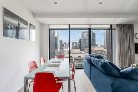 Dine at the spacious six-seater table, taking in views across the Melbourne skyline.