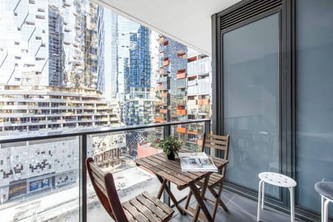 Overlooking the glistening city skyline, the balcony provides an urban retreat where you can sip your morning coffee or perhaps an afternoon wine.
