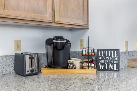 Coffee bar with an assortment of k-cups and tea.