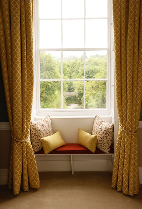 The window seat looking down to the river in the Georgian bedoom