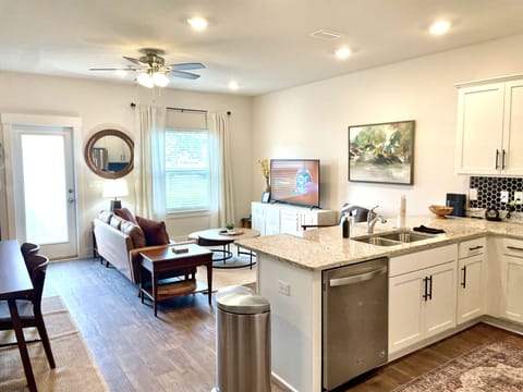 Entertainment at Every Angle: Enjoy Your Favorite Shows and Movies as You Watch TV from the Comfort of the Kitchen, Combining Culinary Delights with Seamless Entertainment in One Vibrant Space.