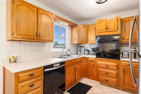 Cook up something delicious in this well-equipped kitchen, designed with everything you need to make your stay convenient and comfortable.
