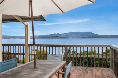 Deck with a View: Savor breathtaking panoramas while dining al fresco on the spacious deck!