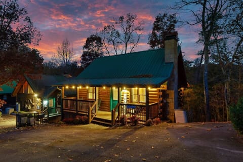 This cozy log cottage has the perfect location for cabin retreat.