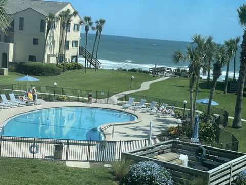 Pool and ocean view from patio