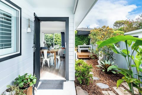 The light-filled home features a modern, coastal colour scheme. 