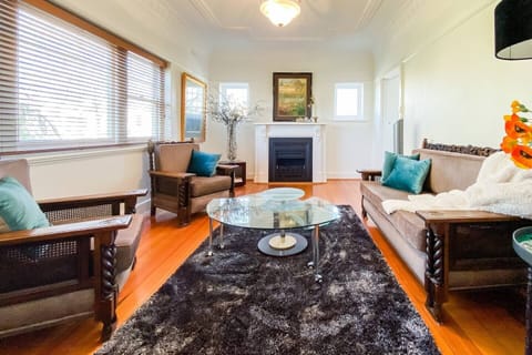 Ornate details, rustic timber flooring and antique furnishings highlight the apartments original Victorian style.