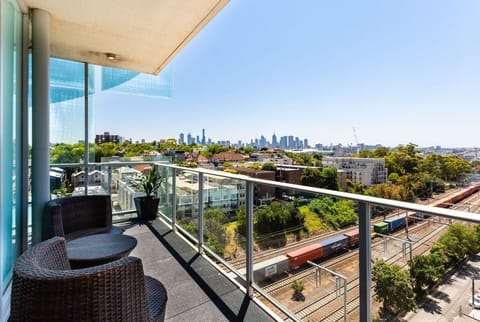 Sip on your morning coffee or evening wine from the comfort of your own balcony, boasting unmatched skyline views.