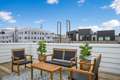 Enjoy drinks or coffee in this modern rooftop nook.