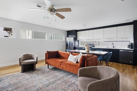 Soft textures and bold accents in a well-lit lounge.