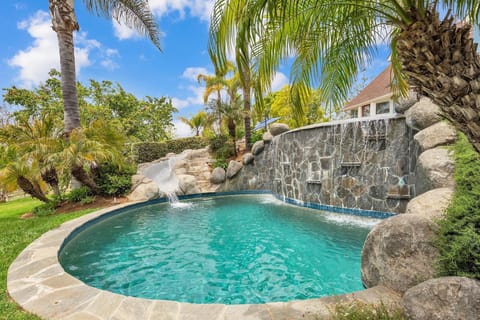 Splash into fun on the waterslide connecting the upper and lower pools. Perfect for family fun, kids, and endless summer excitement.