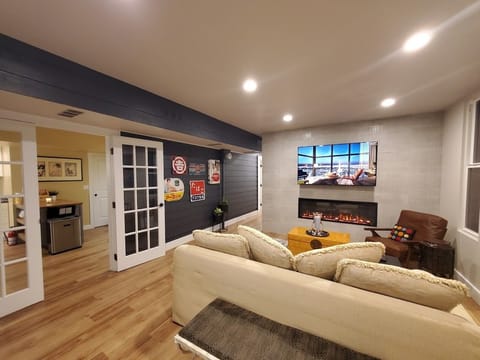 living Room - 65"TV & Elec. fireplace