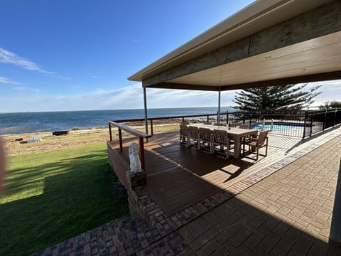 Rear Decking & Dining Area with Beach Frontage