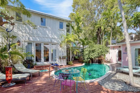 Lounge poolside at the shared outdoor area.