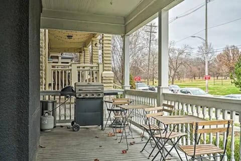 Our patio features two charming wooden table sets with chairs, perfect for al fresco dining, and a griller for your cookout delightsโall with a beautiful view of nature.