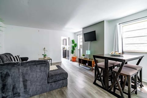 Surround yourself with lush greenery in our expansive living room. High-end fixtures, fast internet, heating & cooling, perfect create unforgettable memories