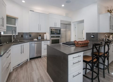 Fully Stocked Kitchen - Breakfast Bar Seating for Two (2)