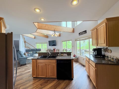 Kitchen open to main floor living with Mountain View