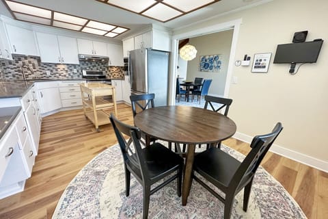 Sit and keep the cook company.