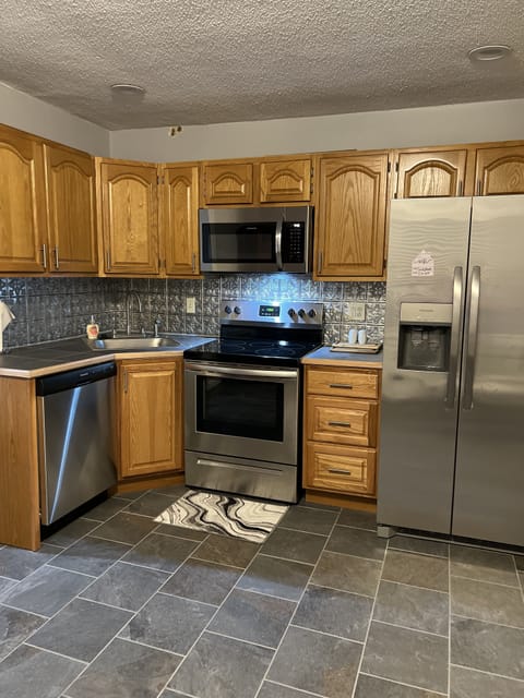 Stainless and slate are prominent in the newly remodeled kitchen.