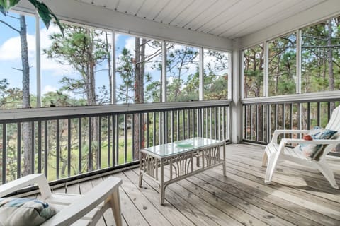 Enjoy the views of the Golf course from the screened in proch