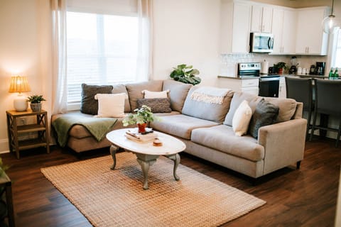 Gather with friends or family in a cozy living area just steps from a fully equipped kitchen.