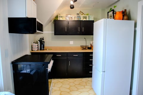 Full kitchen with a top of the line Samsung induction range.