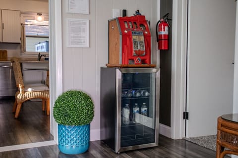 Grab a complimentary bottle of water or stock the mini-fridge with your own beverages.