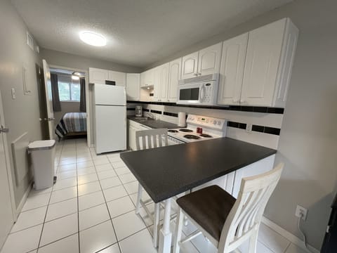 Full size fully equipped kitchen with a Keurig and a traditional coffee maker.