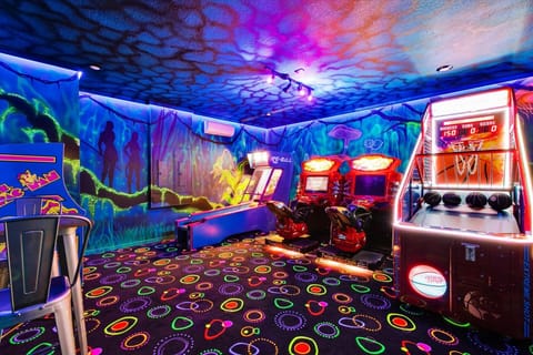 Game Room - Avatar, Downstairs: 
Has AC, Extreme Shot Arcade, Multi Video Arcade, 2 Nascar Racing Arcades, Skeeball