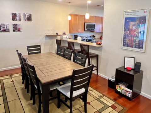 Dining area on main floor seats 11 including 8 around dining table.